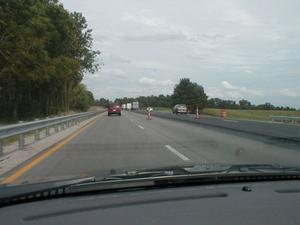 Northbound on I-65. A final layer of asphalt is being added. (August 15, 2002)