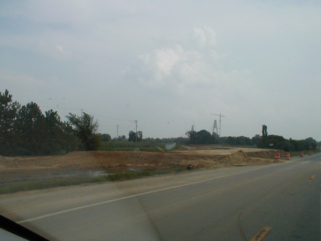 Facing south on US 231 towards the bridge. Both towers are visible as are ramps for the new interchange.