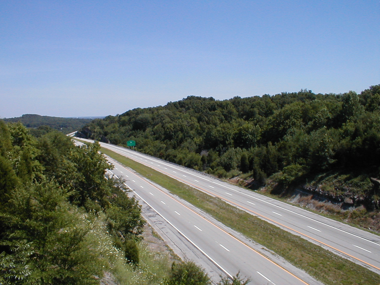 From the top of the bridge looking south over the parkway. The city of Bowling Green is in the distance.