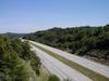 From the top of the bridge looking south over the parkway. The city of Bowling Green is in the distance.
