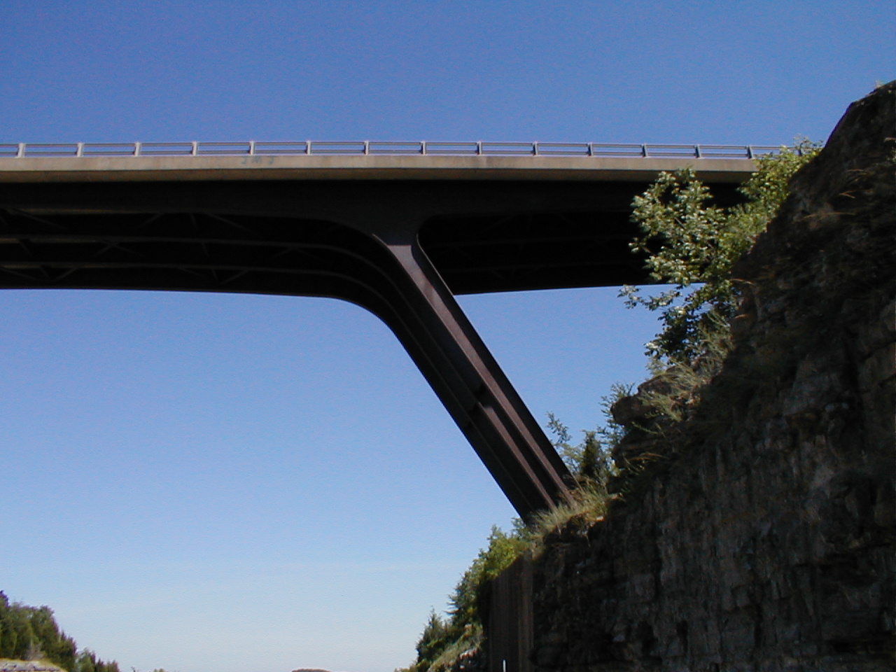 A view of the underside and supports of the bridge.
