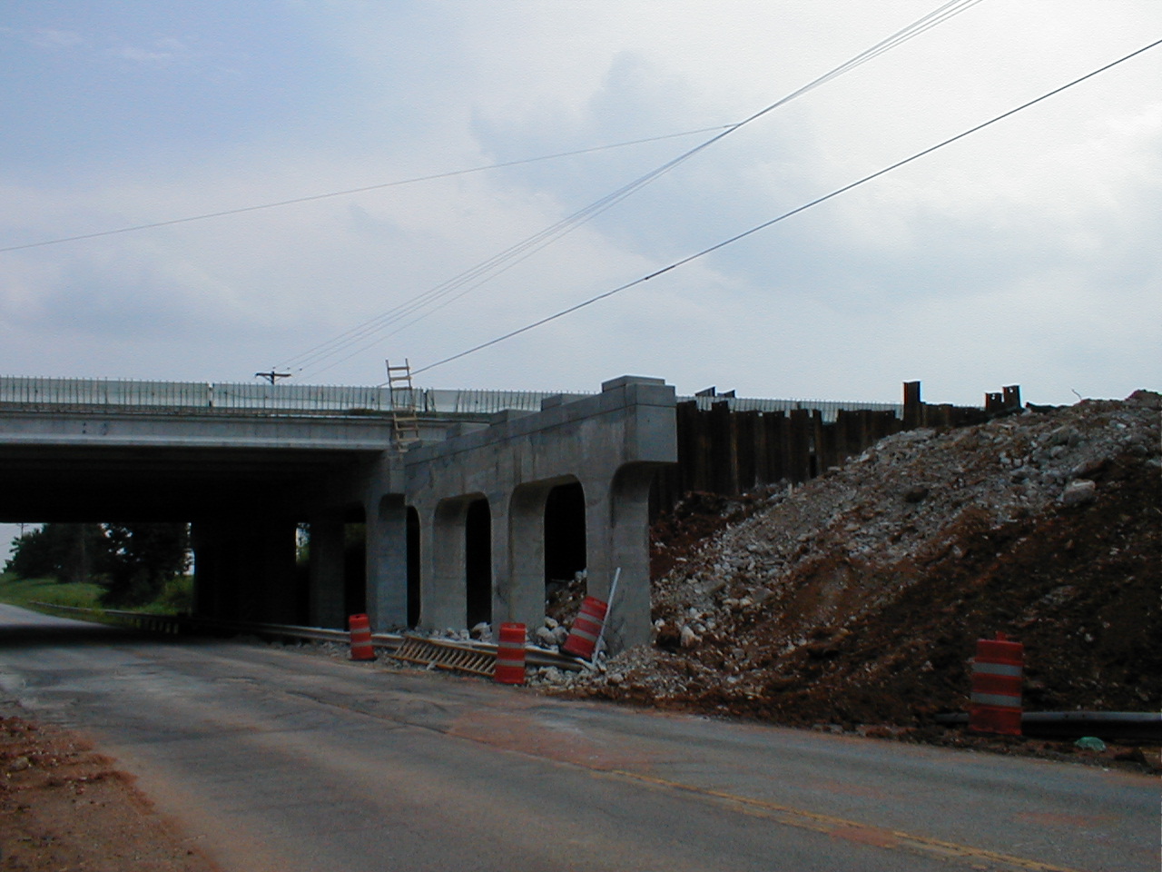 Shows where the old roadbed has been removed and a new roadbed is being built.