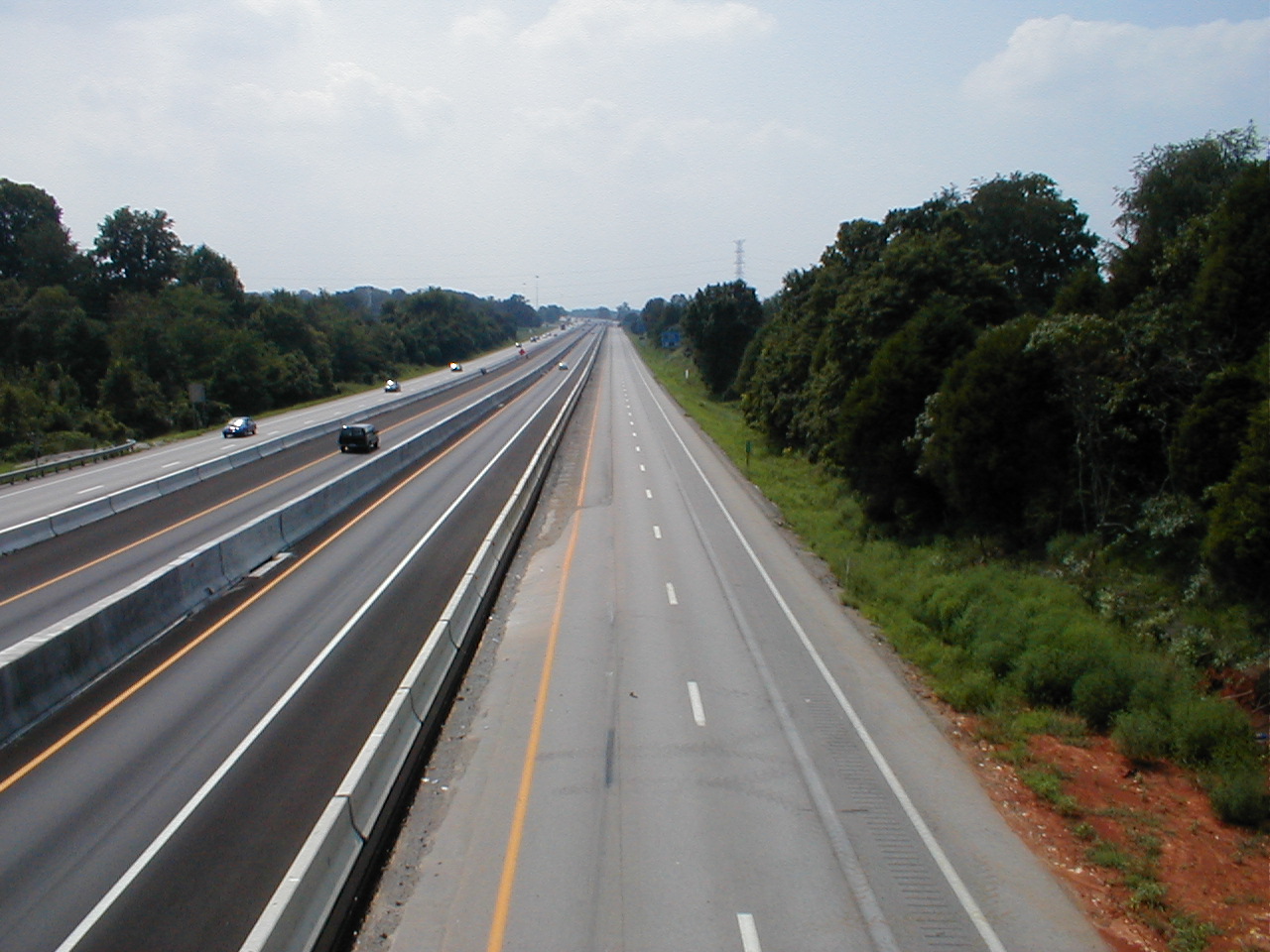 An overhead view of I-65 showing the old abandoned south bound lanes.