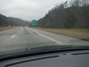Signage for the upcoming exit to KY 67 from I-64 westbound (January 3, 2003)