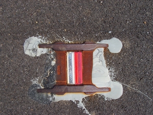 Two-colored reflector.