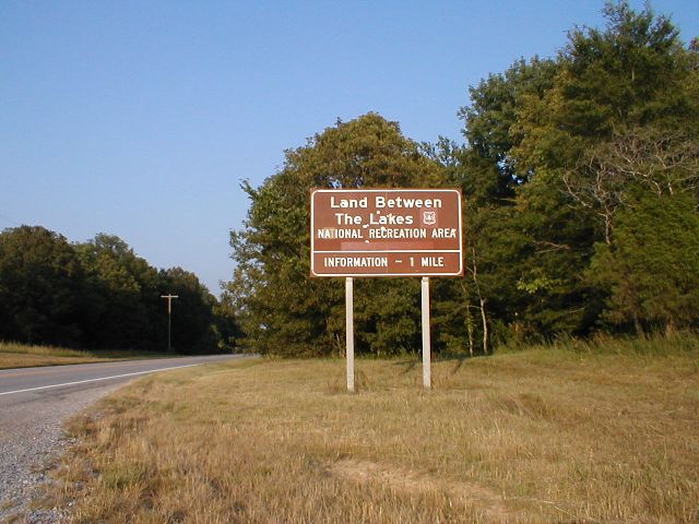 The words "Tennessee Valley Authority" have been removed from this sign notifying travelers that they are nearing the visitor center.