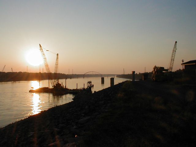 Looking from Kentucky Dam towards I-24's suspended arch bridge over the Tennessee River.