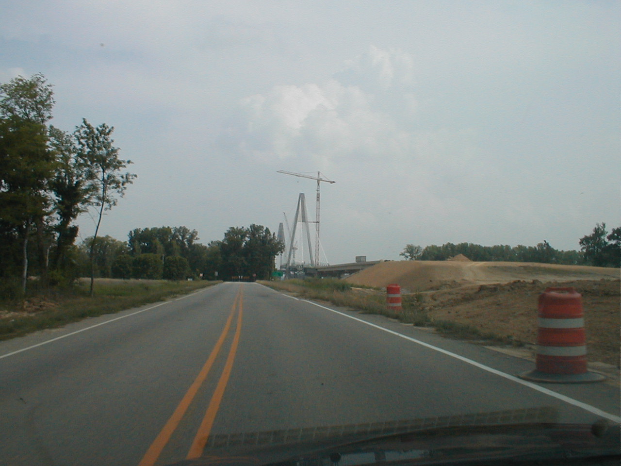 Facing south on US 231 towards the bridge. This is at the IN 66 intersection. Both towers and their cables are visible.