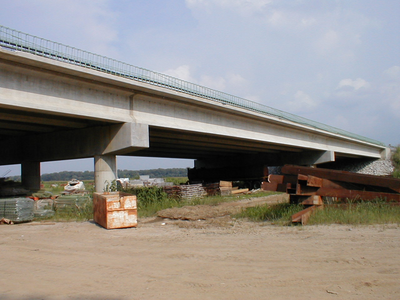 The barrier along the south approach of the bridge is still under construction.