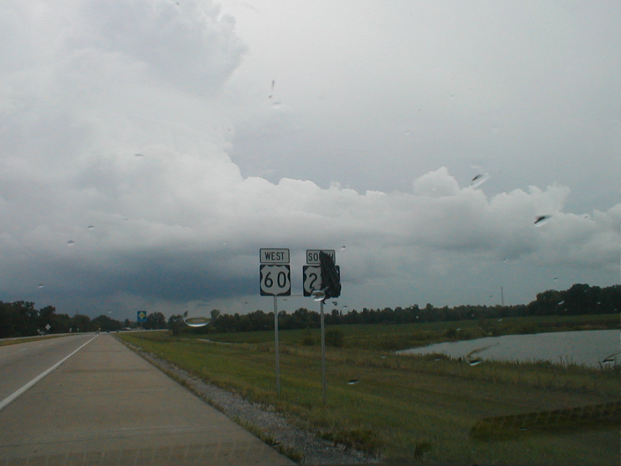 A US 60 sign and a partially covered US 231 sign.