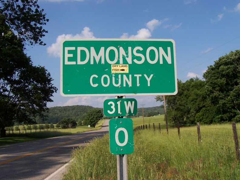 Mile marker and county identification entering Edmonson County from Warren County on US 31W.