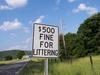Regulatory sign denoting fine for littering.